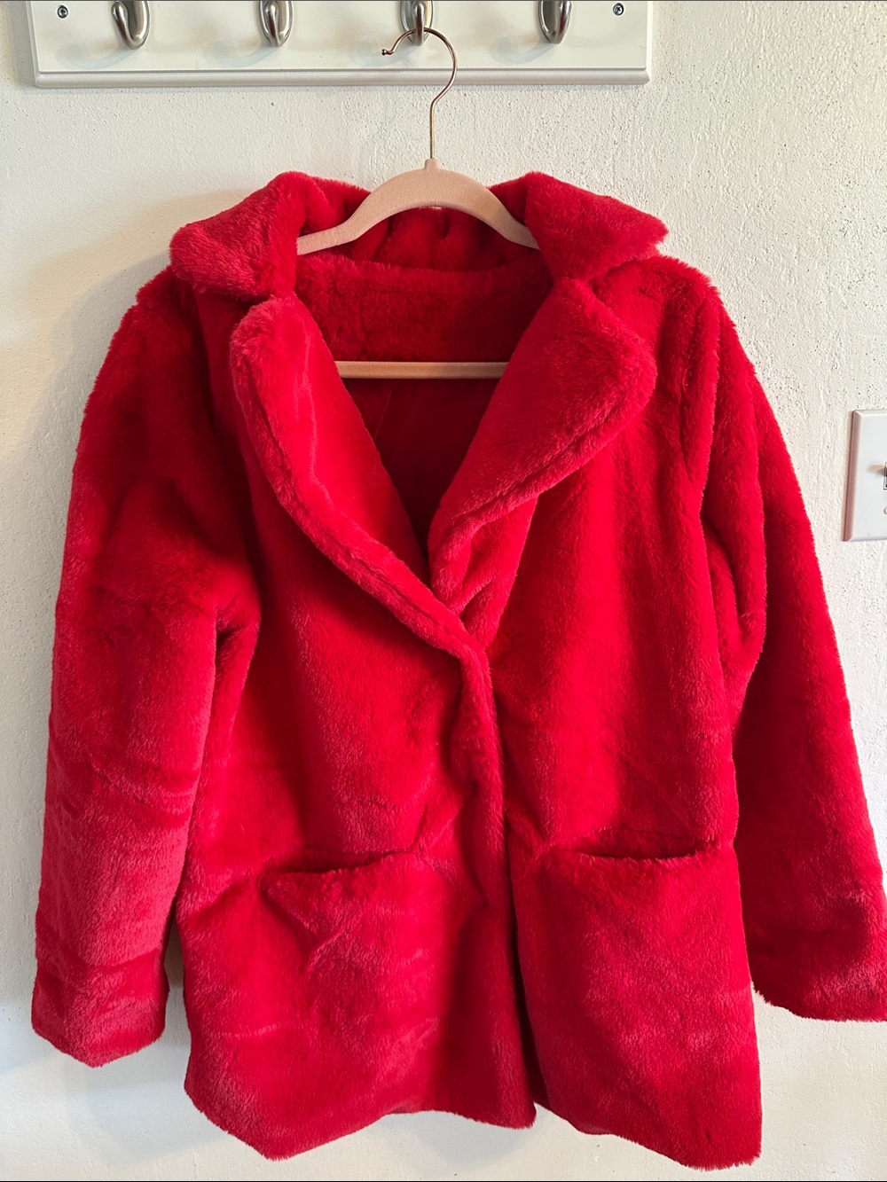Red fake fur jacket size Medium, 3 snaps , 2 pockets